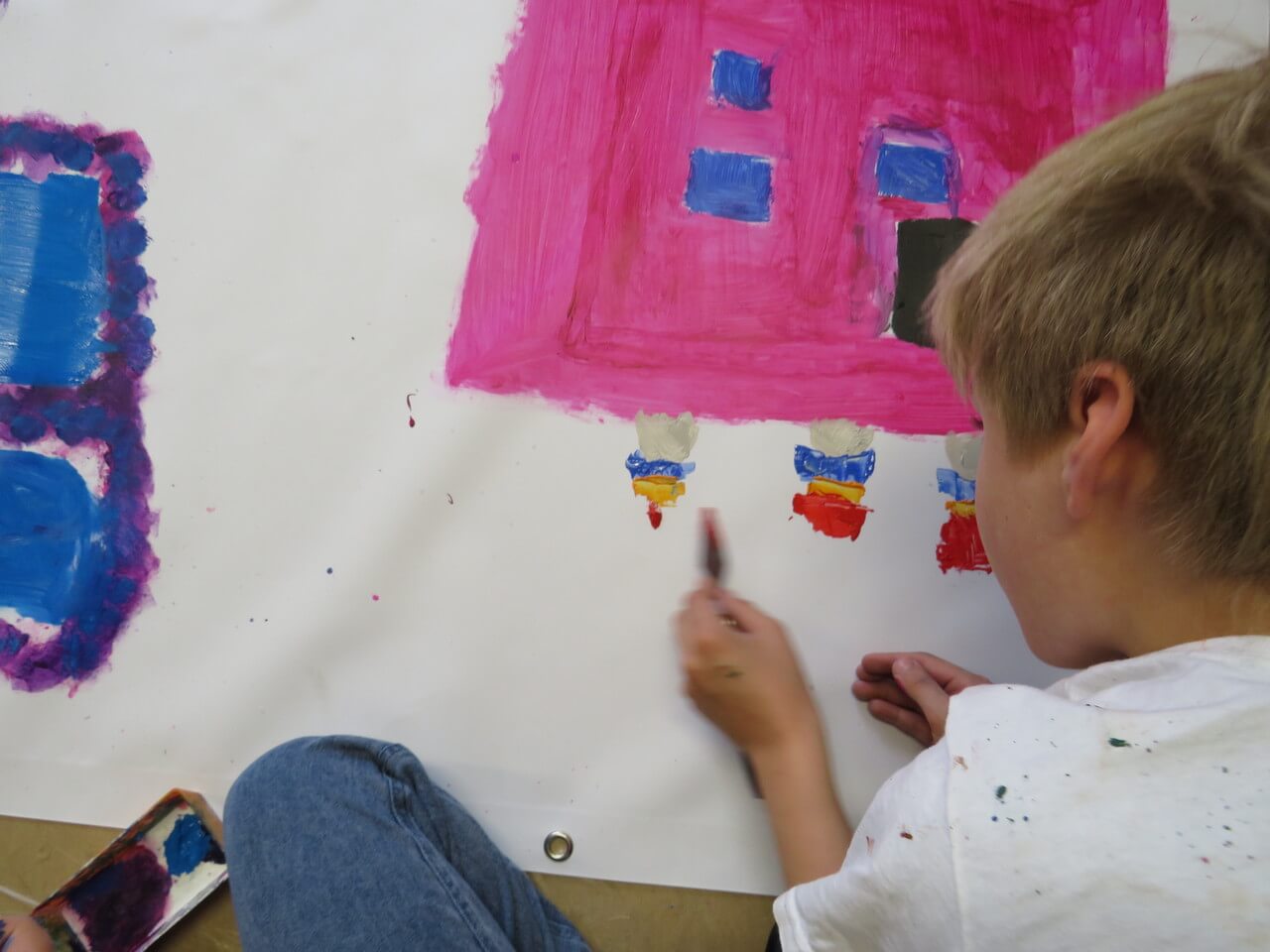 Kinder gestalten Bauzaun